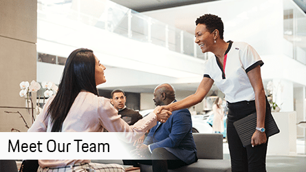 a technician standing at a dealership