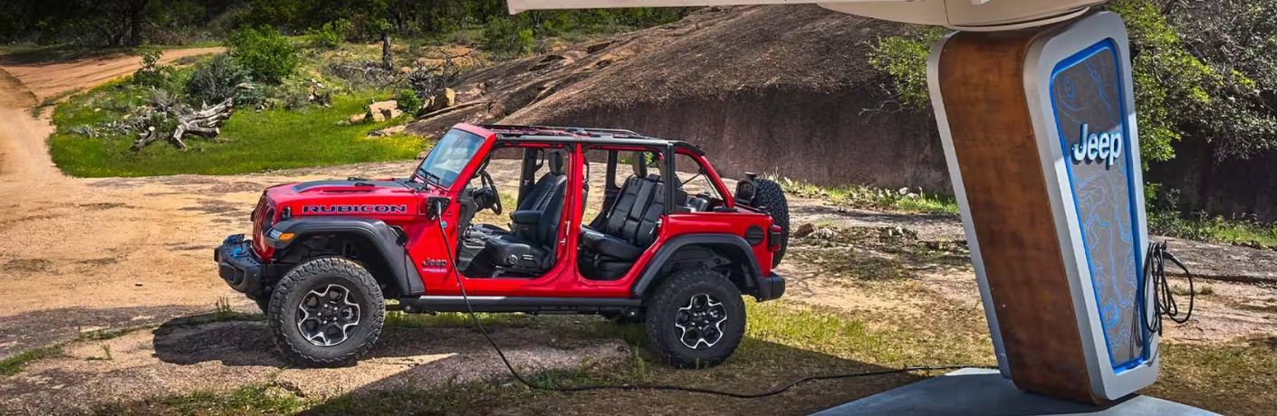 2025 Jeep Wrangler Rubicon 4xe at a charging station