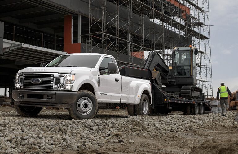 white 2020 Ford Super Duty at a work site