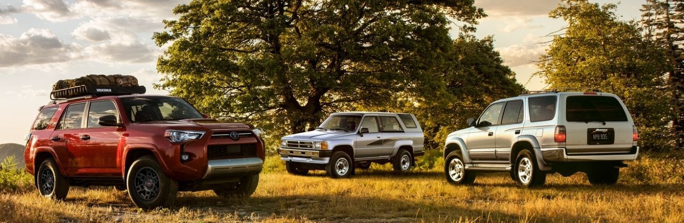 Three Toyota 4Runners parked outside