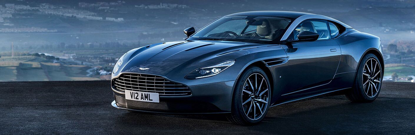 2017 Aston Martin in front of a painted landscape