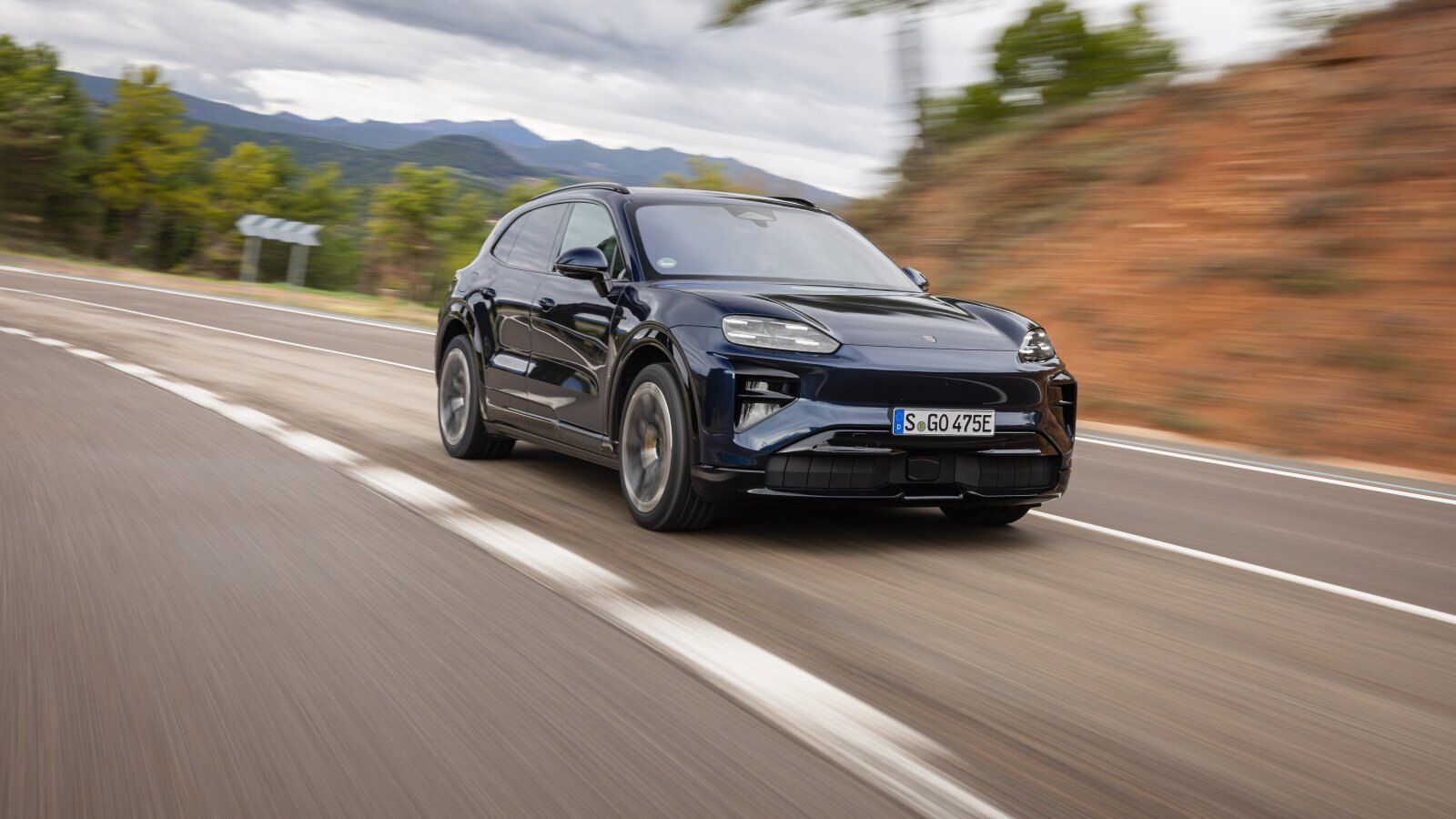 Porsche Cayenne with PASM on a country road – Champion Porsche Pompano Beach, FL