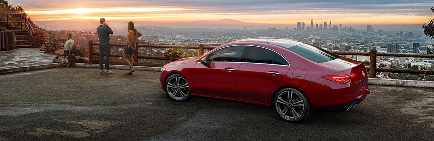 2020 MB CLA exterior rear fascia driver side on overlook with people looking out at city