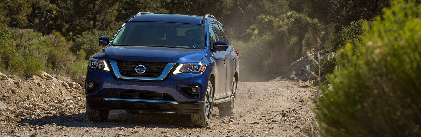 Nissan Pathfinder on an unpaved road