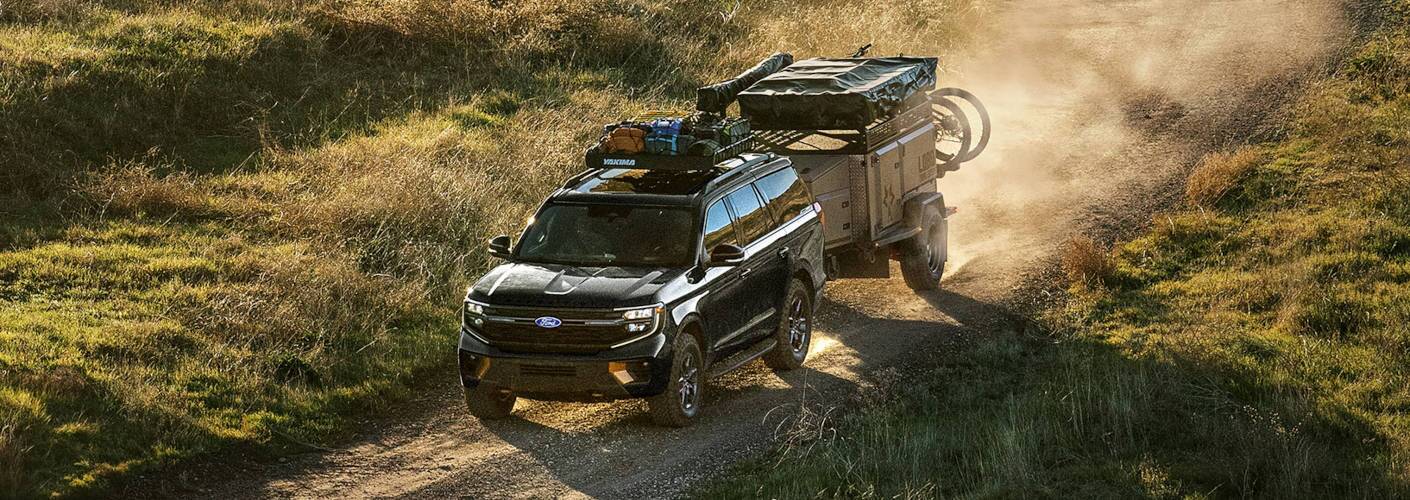 The 2027 Ford Expedition towing and hauling camping equipment near Atlanta, GA.