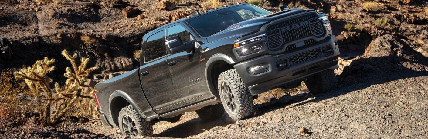 Front quarter view of the Ram 2500 Rebel climbing a hill