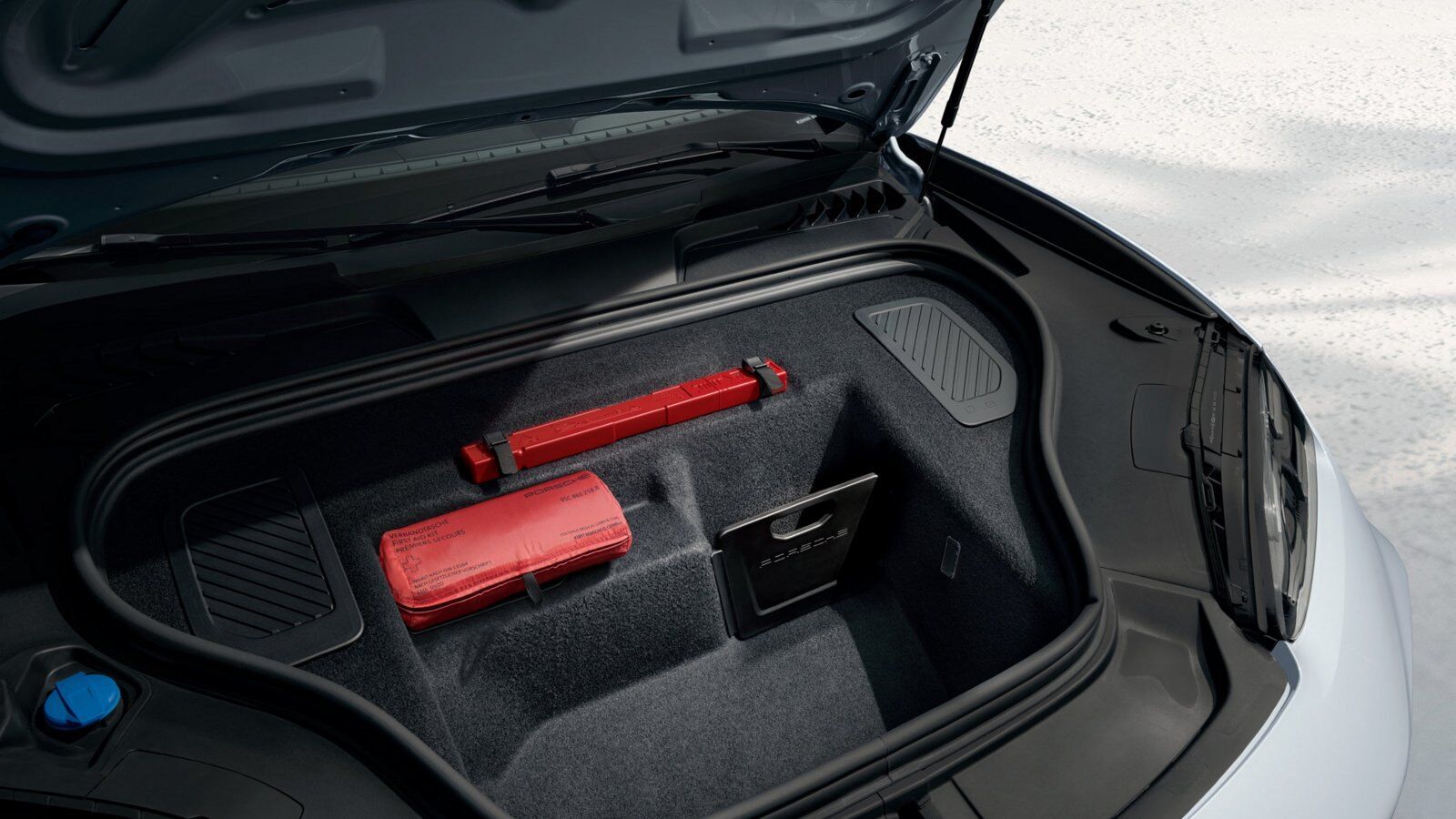 Porsche charge port with the battery preconditioned by the Charging Planner – Champion Porsche Pompano Beach, FL