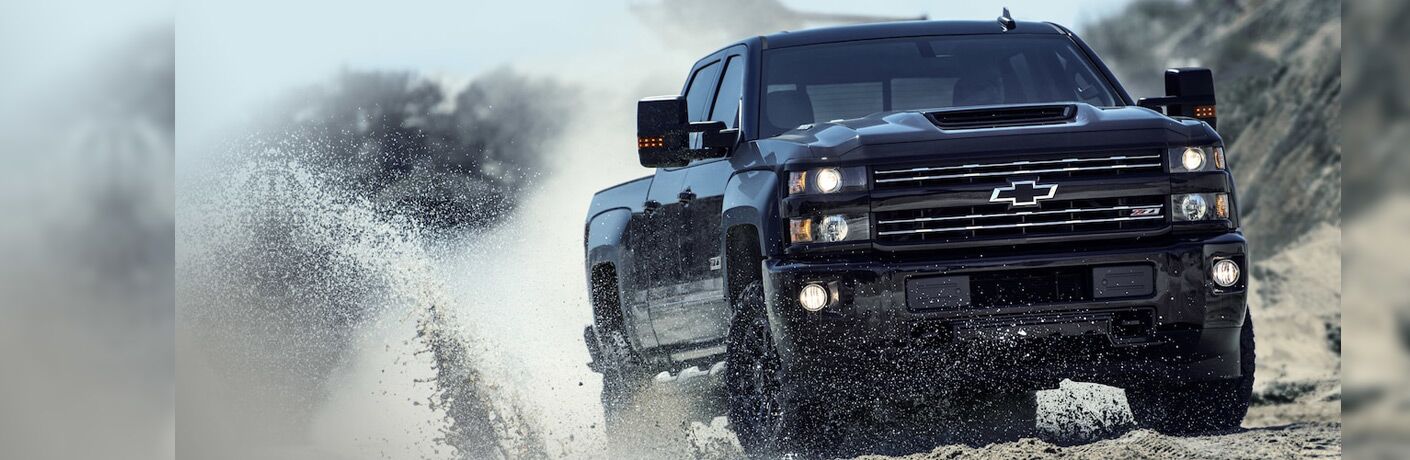 front view of a black Chevy Silverado HD