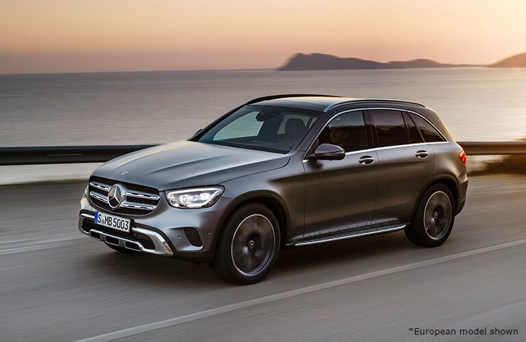 2020 MB GLC exterior front fascia driver side on blurred road next to ocean