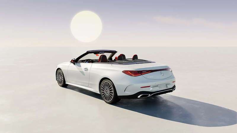 A rear exterior view of the 2025 Mercedes-Benz CLE 300 4MATIC® Cabriolet with its top down
