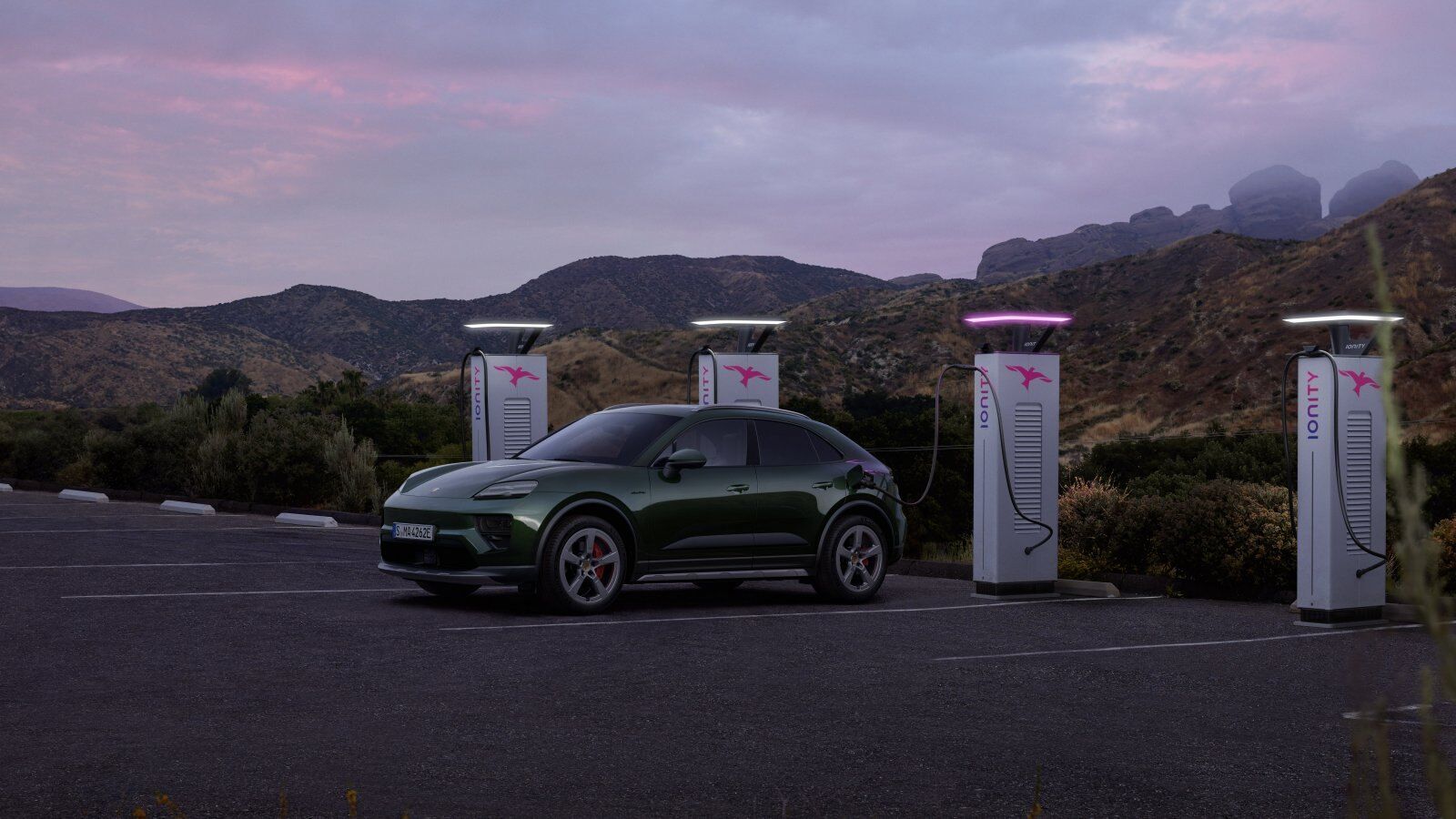 Porsche Macan Electric at a DC fast-charging station on a planned route – Champion Porsche Pompano Beach, FL