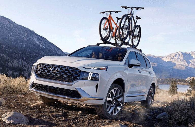 A couple driving the 2021 Hyundai Santa