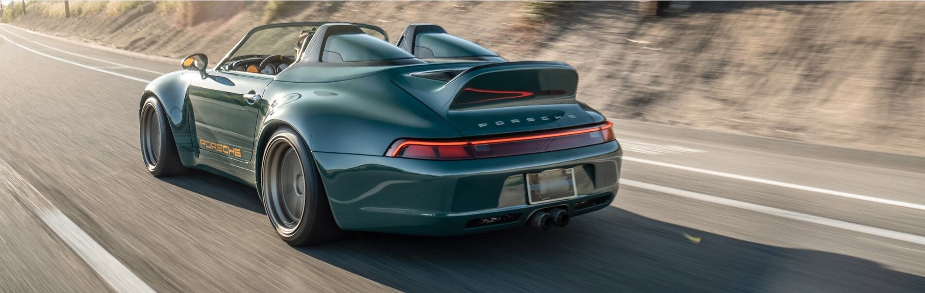 Porsche Speedster rear view on a road