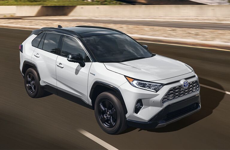 2021 Toyota RAV4 Hybrid white side front view