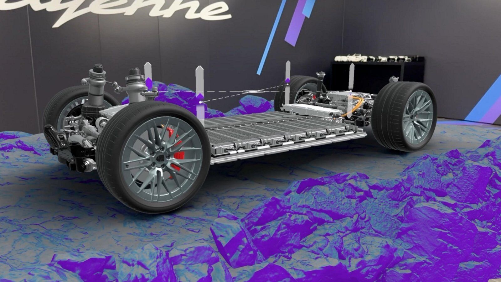 Porsche chassis cutaway showing the PDCC active anti-roll bars and suspension – Champion Porsche Pompano Beach, FL