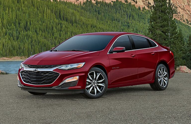 2023 Chevrolet Malibu in red front and side view