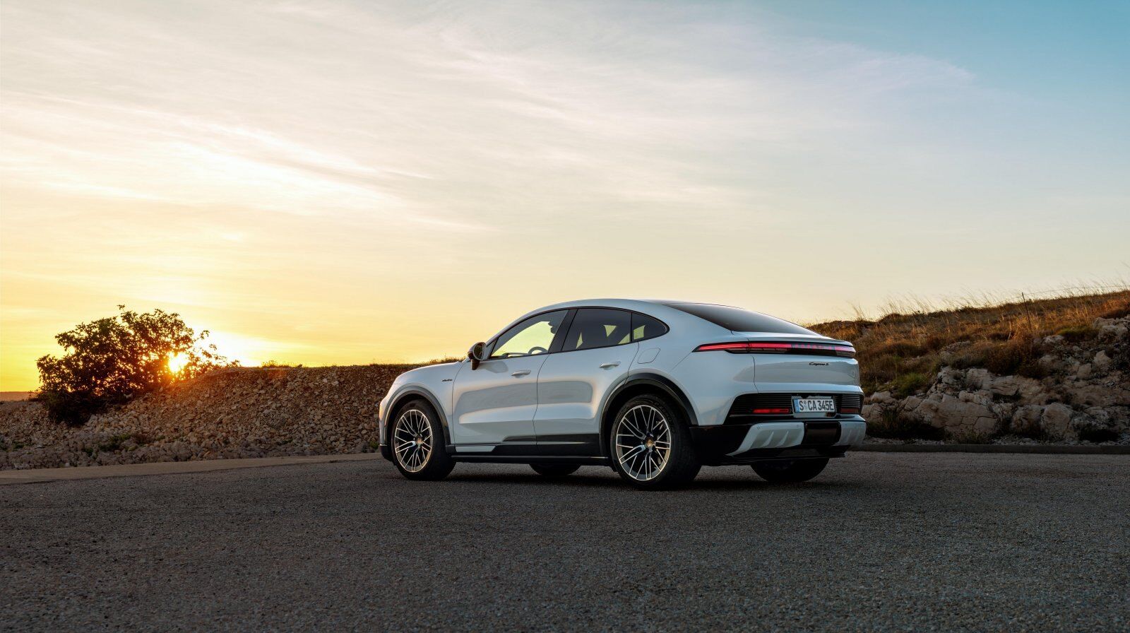Porsche Cayenne at sunset – active anti-roll control across the model range – Champion Porsche Pompano Beach, FL