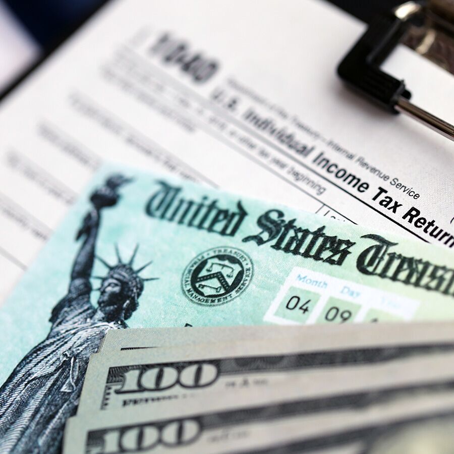 close up of money and tax return document