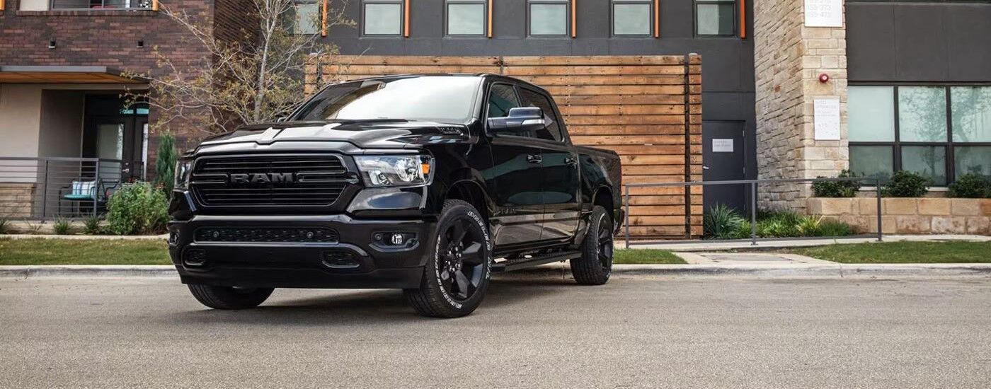 Black 2020 Ram 1500 parked in a driveway