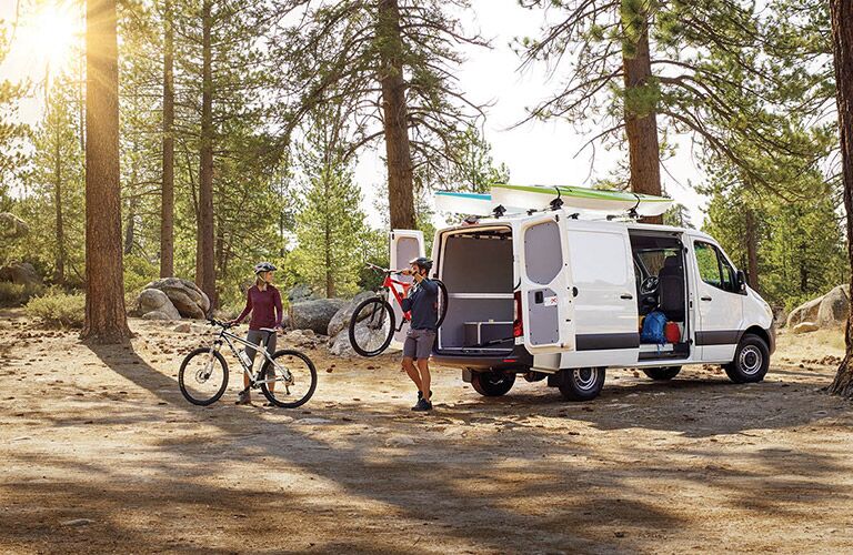 2022 Mercedes-Benz Metris Cargo Van with two cyclists