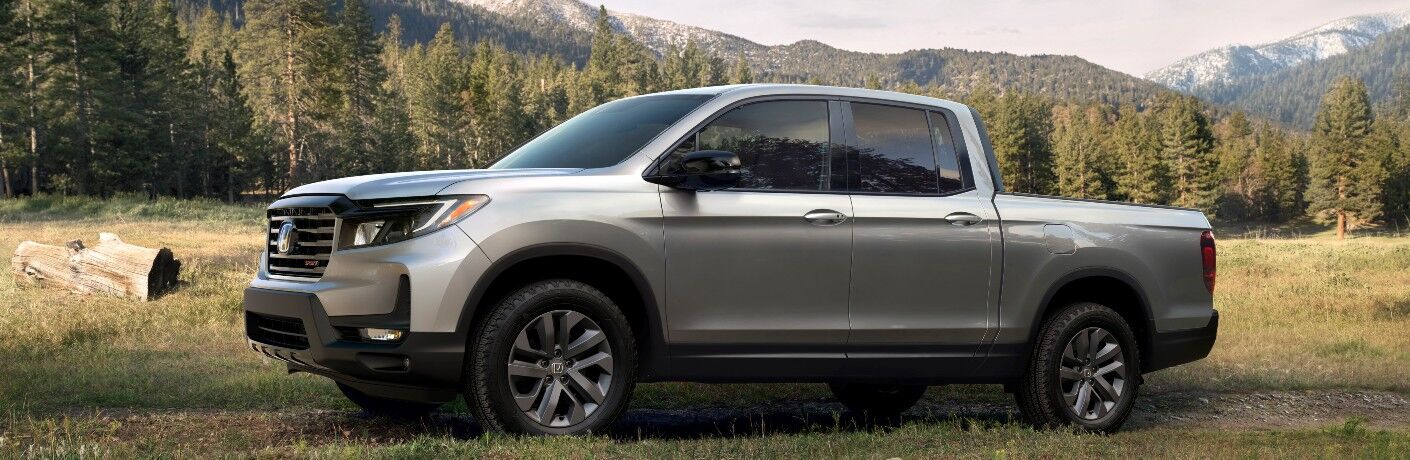side view of a used silver Honda Ridgeline