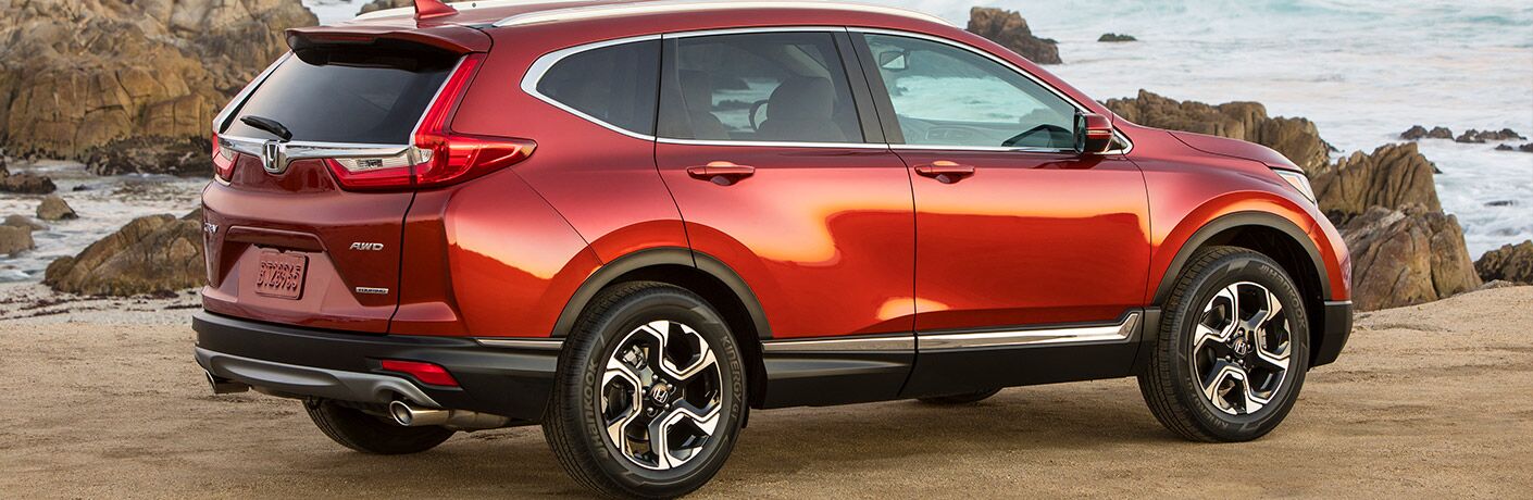 Red 2019 Honda CR-V Rear and Side Exterior Next to the Water
