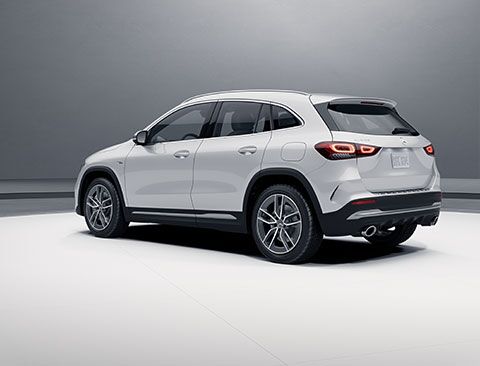AMG GLA shown in Polar White with optional AMG body styling and 19-inch AMG twin 5-spoke wheels