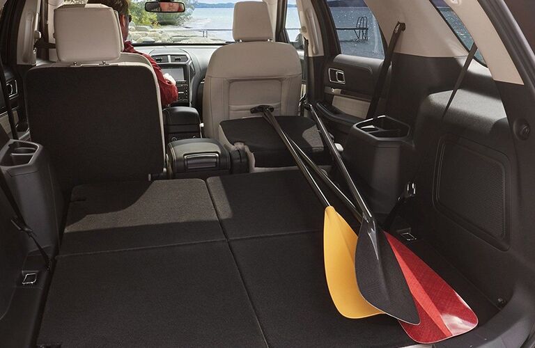 Paddles in rear cargo area of 2019 Ford Explorer Limited