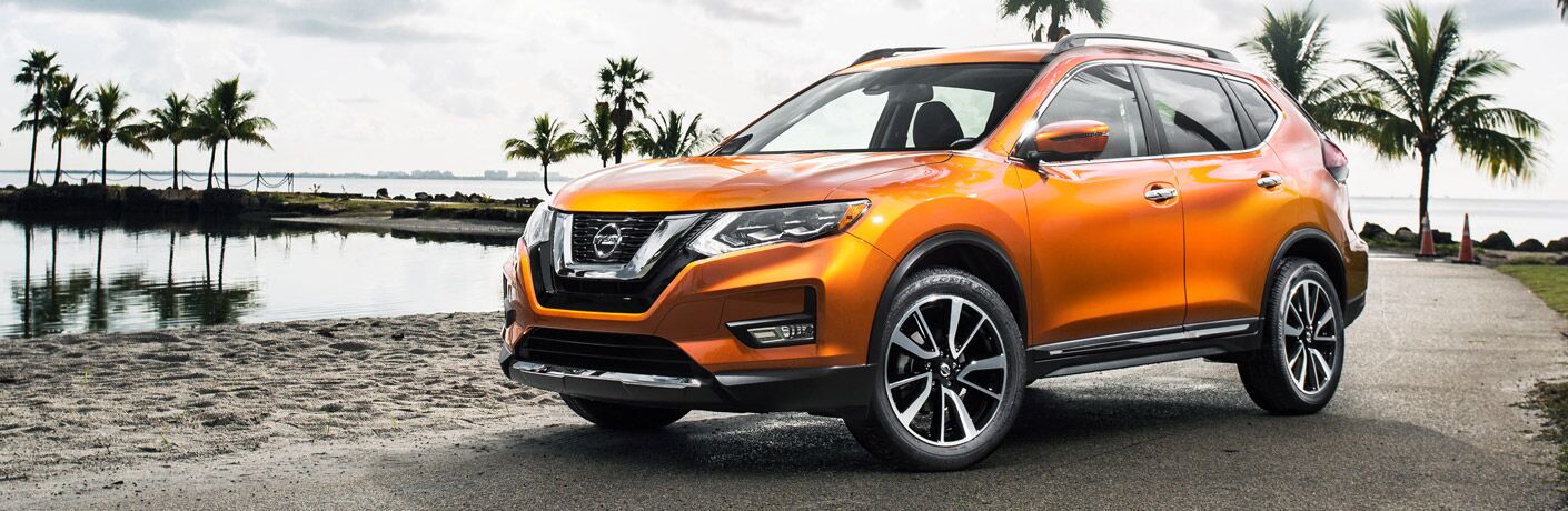 2017 Nissan Rogue in front of beach scenery