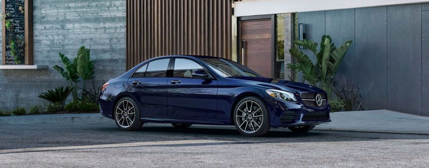 Blue 2020 Mercedes-Benz C-Class parked in a driveway