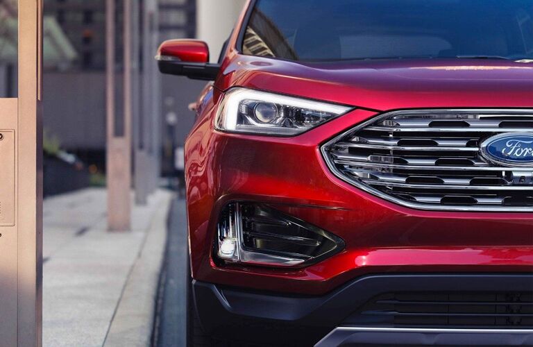 Passenger headlight and grille of 2019 Ford Edge SEL