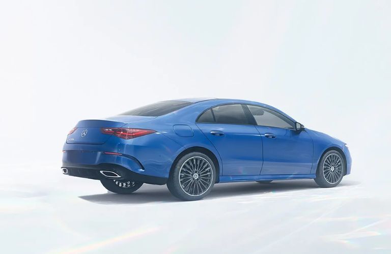 Rear three-quarter view of the 2024 Mercedes-Benz CLA Coupe parked