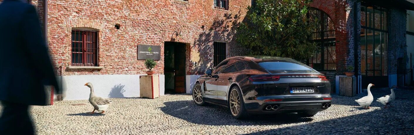 2020 Porsche Panamera parked by a building