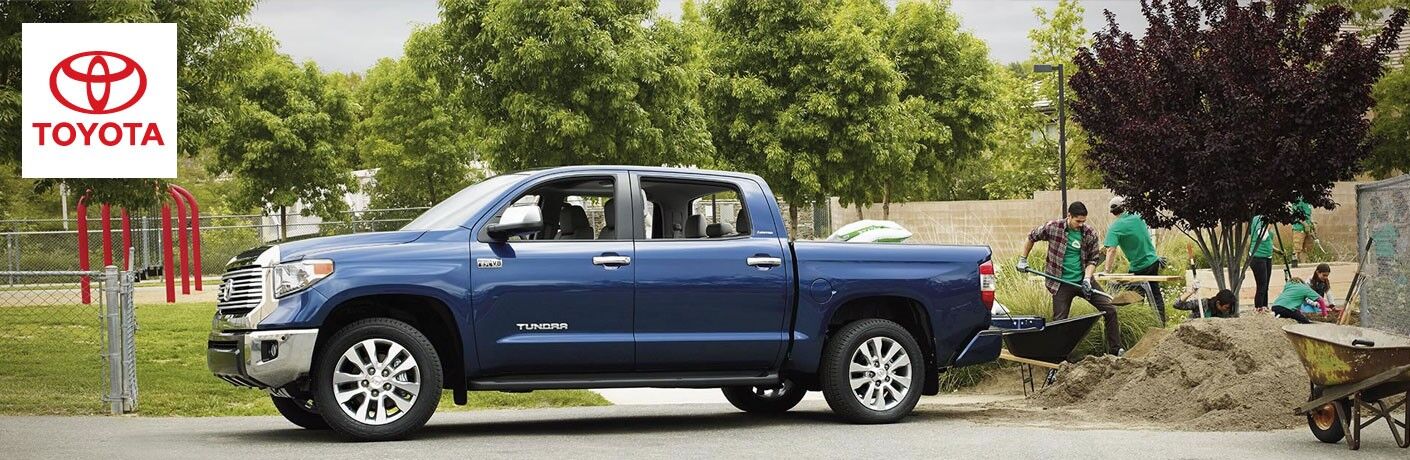 blue Toyota Tundra parked in parking lot of park