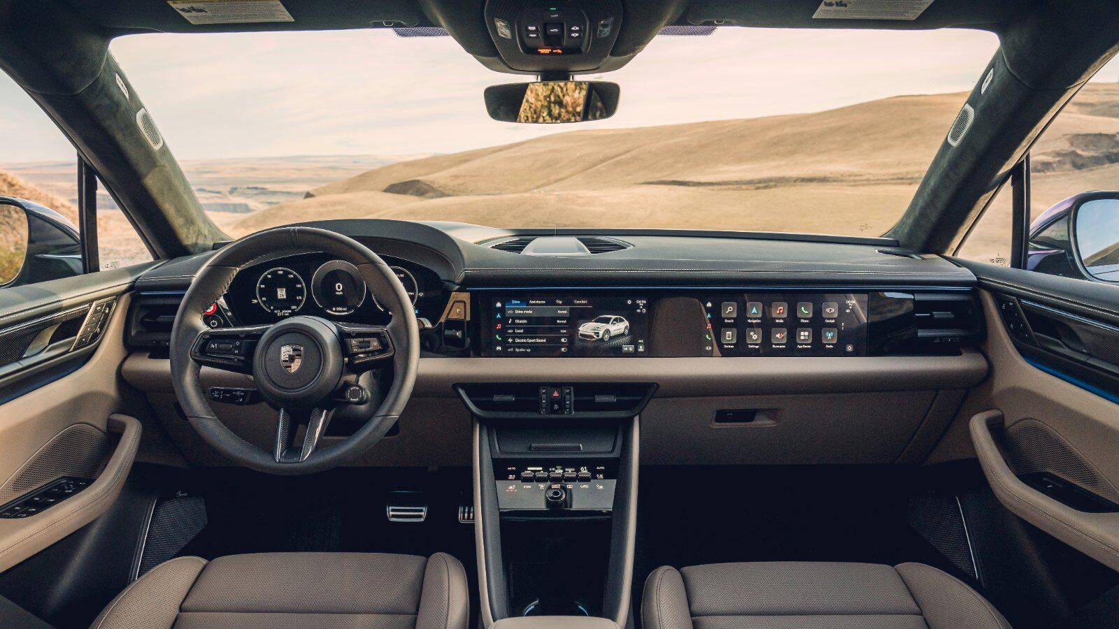 Porsche Macan Electric interior where 3D Surround View appears on the center display – Champion Porsche Pompano Beach, FL
