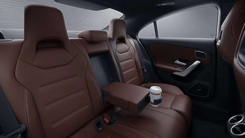 The rear seating with center console and cupholder in the CLA 250 4MATIC® Coupe