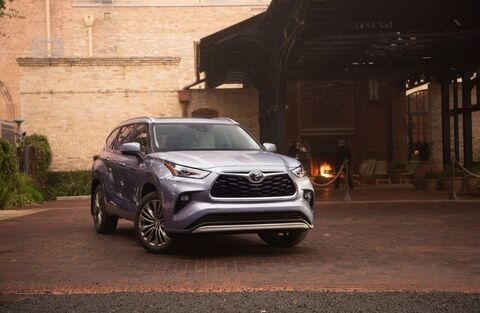 2022 Toyota Highlander parked outside a house