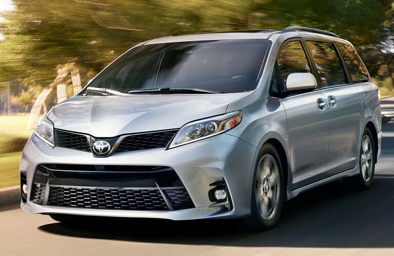 Silver 2018 Toyota Sienna on a suburban street