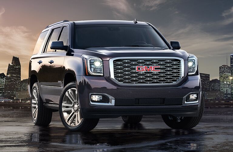 front view of the 2018 GMC Yukon in a cityscape