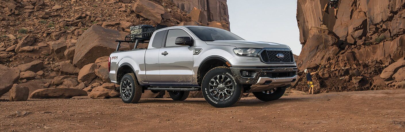 Side view of the 2022 Ford Ranger Gray parked near mountain