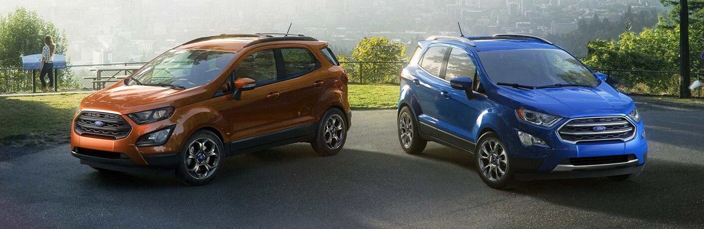Two 2019 Ford EcoSport models parked with trees in background