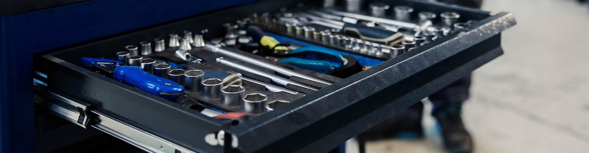 automotive technician diagnosing vehicle for service repair