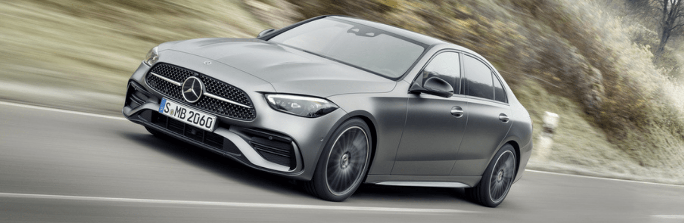 Gray 2022 Mercedes-Benz C-Class Front vs Gray 2022 Audi A4 Front