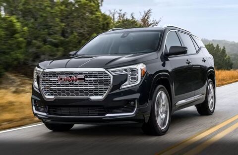 2024 GMC Terrain Black driving on the road