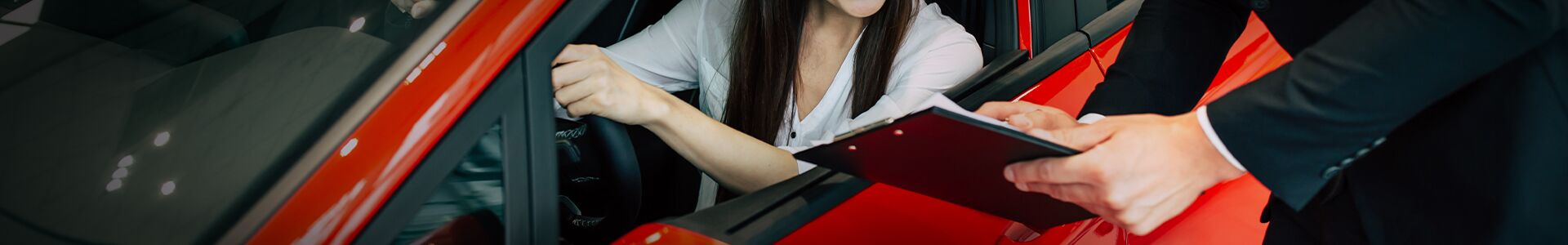 red car on country road - lightning motorsports warranty