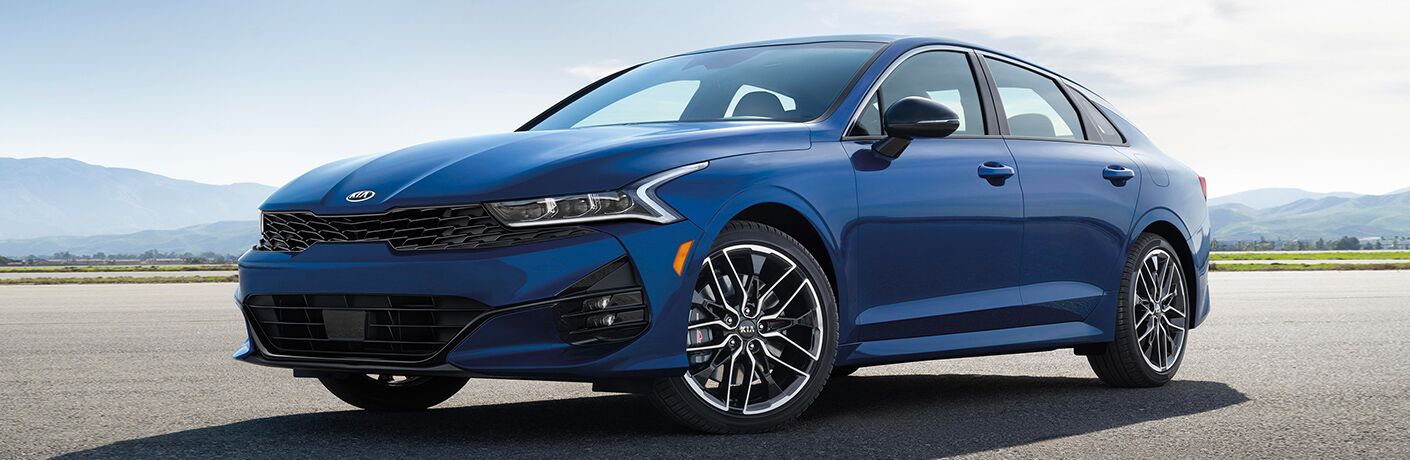 Exterior view of a blue 2021 Kia K5
