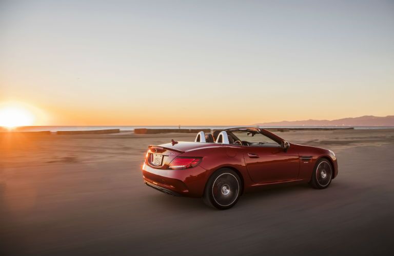 2017 MB SLC exterior back fascia and passenger side on beach with sunrise