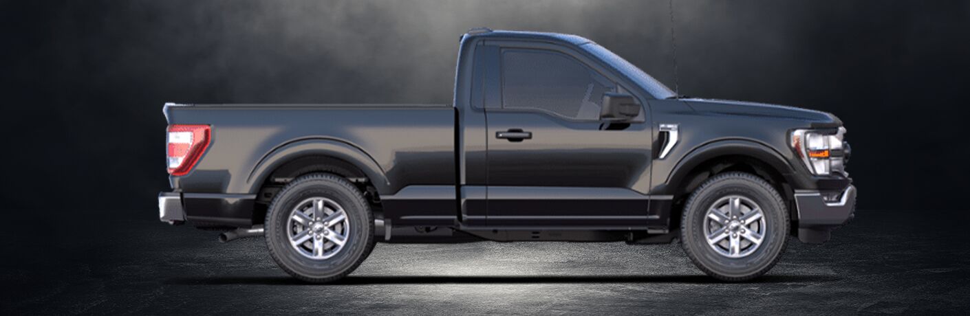 2021 Ford F-150 XLT side view on black