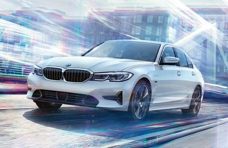 2022 BMW 3 Series front view on a road