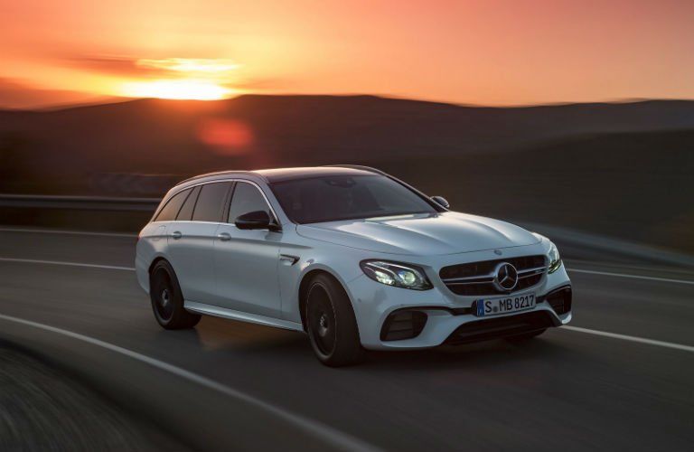 2018 Mercedes AMG® E 63 S Wagon with a sunset behind it